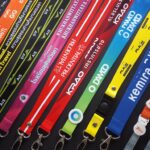 สายคล้องบัตร สายคล้องคอ สกรีนข้อความ ออกแบบสายคล้องสวย พิมพ์ชื่อบริษัท สายคล้องใส่โลโก้