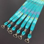 โรงงาน ผลิต สายคล้องบัตร สายห้อยป้าย สรีนชื่อ สอดสี พิมพ์ซับลิเมชั่น สีเขียว วัตสัน