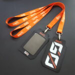 สายคล้องคอ GO KMTL สีส้มพร้อมซองใส่บัตรสีดำ