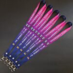 โรงงาน สายคล้องบัตร สายห้อยป้าย สรีนชื่อ สอดสี พิมพ์ซับลิเมชั่น ไล่สี สีม่วง น้ำเงิน